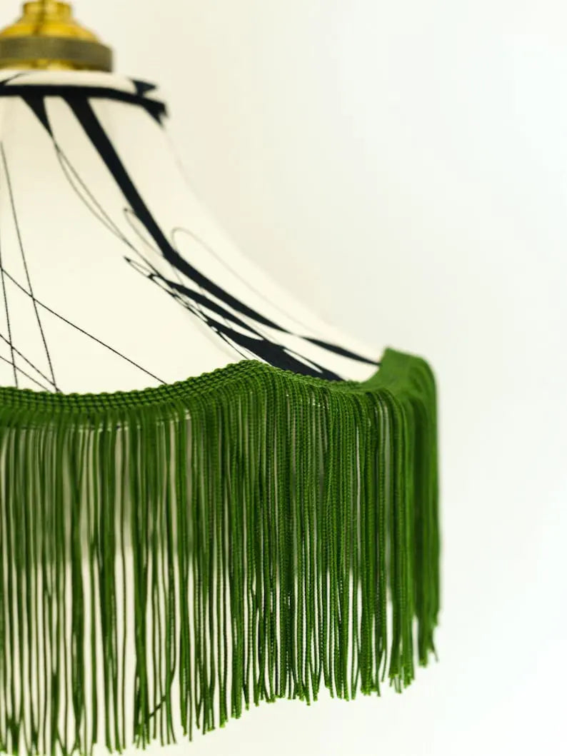 Suspension baladeuse tissu noir et blanc/Franges vertes