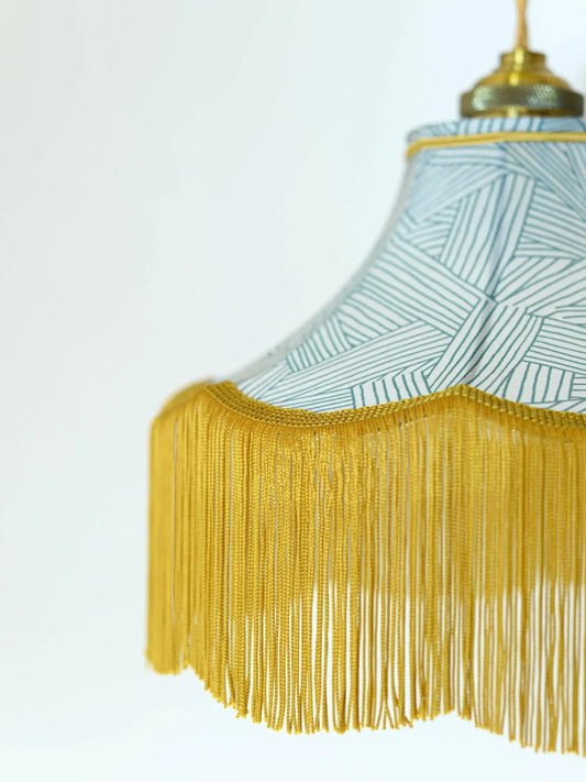 Baladeuse pagode tissu viscose vert et blanc/franges dorées - Lumière à tous les Etages