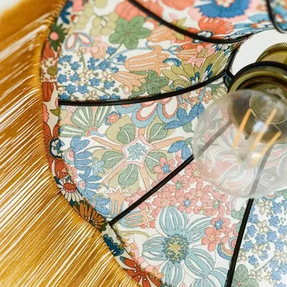 Baladeuse pagode tissu liberty fleuri/franges dorées - Lumière à tous les Etages 