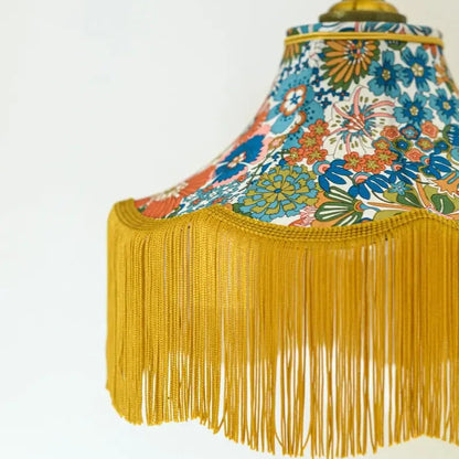 Baladeuse pagode tissu liberty fleuri/franges dorées - Lumière à tous les Etages 